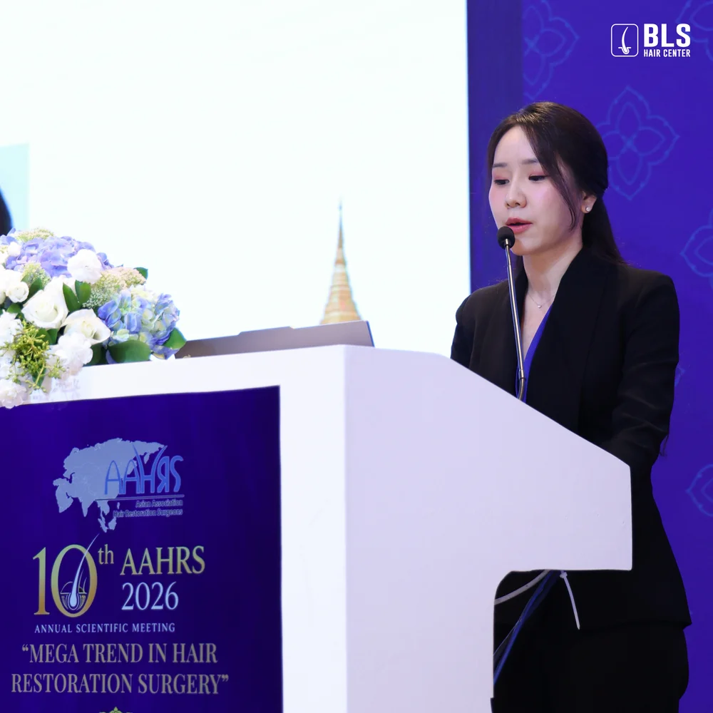 หมอบี ปลูกผม BLS Hair Center บรรยายในงาน AAHRS 2026